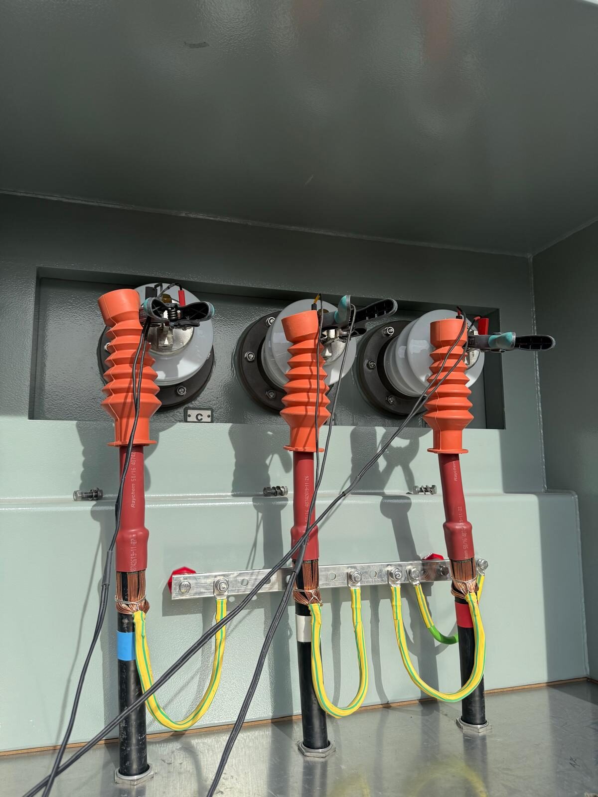 High voltage cable terminations with earth leads landed on a switchboard